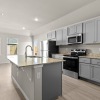 Well-lit kitchen with ample counter space