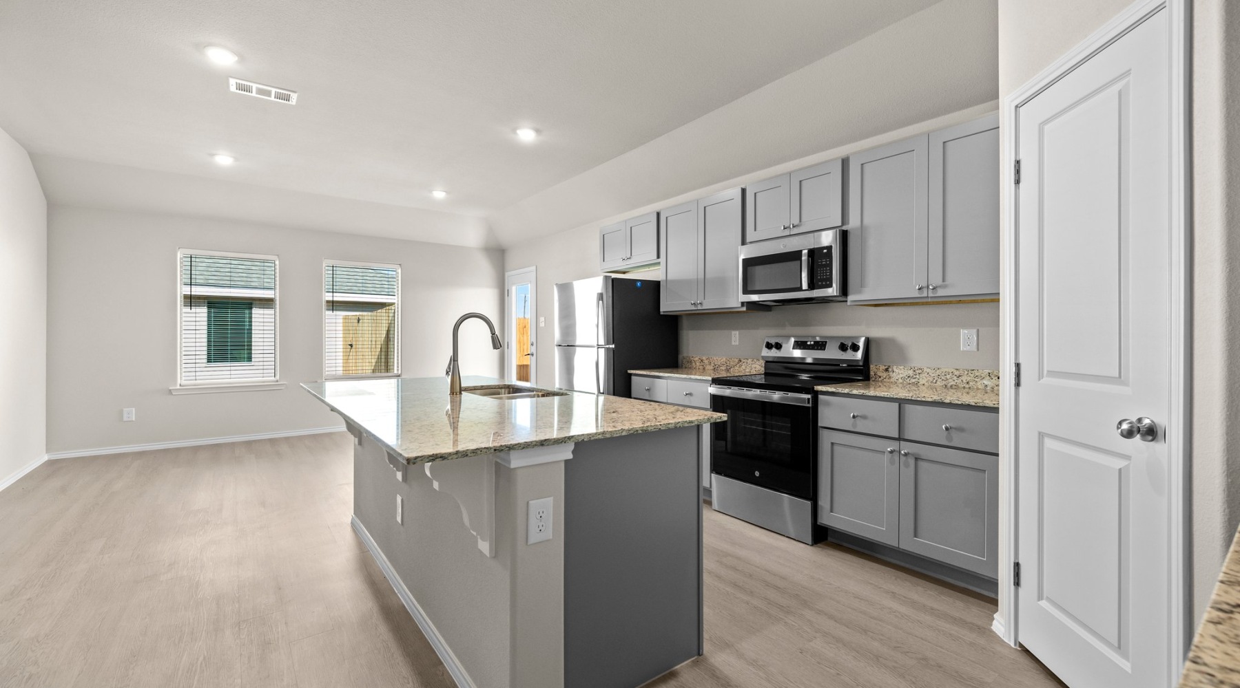 Well-lit kitchen with ample counter space
